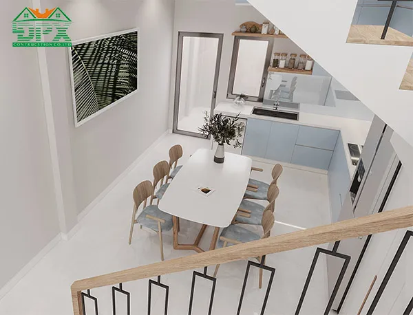 Nơi đặt bồn rửa chén được thiết kế thêm cửa sổ lấy sáng nhìn ra sân sau thông thoáng
