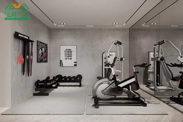 Phòng tập gym với máy chạy, máy đạp xe và dàn tạ